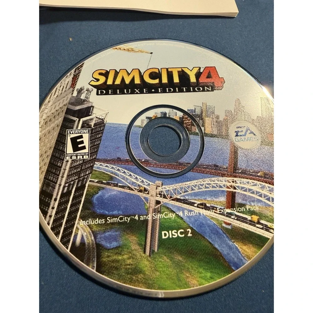 SIM CITY 4: Deluxe Edition (PC Game CD-ROM, 2003) 2 Discs with Manual in Case.
